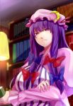  book bookshelf breasts crossed_arms highres holding holding_book lamp large_breasts looking_at_viewer minamike1991 patchouli_knowledge solo touhou 