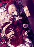 1girl amezawa_koma blonde_hair bow box flower hands_clasped hands_on_own_chest hat in_container interlocked_fingers lolita_fashion long_hair looking_at_viewer lying on_back opening petals red_eyes red_rose rose rozen_maiden shinku solo twintails very_long_hair 