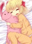  1girl blonde_hair highres kaoru_(rena12345) pajamas rumia sleeping solo stuffed_animal stuffed_toy touhou 
