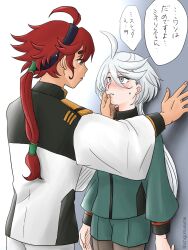  2girls ahoge asticassia_school_uniform black_hairband blue_eyes blush commentary_request green_jacket green_shorts grey_eyes gundam gundam_suisei_no_majo hairband hand_on_another&#039;s_face highres ichigomusume604 jacket kabedon long_hair looking_at_another miorine_rembran multiple_girls parted_lips red_hair school_uniform shorts speech_bubble suletta_mercury thick_eyebrows translation_request white_hair white_jacket yuri 
