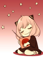  1girl anya_(spy_x_family) black_dress child closed_eyes commentary dress endou_tatsuya full_body hairpods hashtag-only_commentary highres holding pink_hair radio sitting solo spy_x_family star_(symbol) tears wariza 