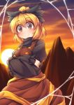  1girl blonde_hair blush bow brown_eyes dress fun_bo hair_bow kurodani_yamame long_sleeves looking_at_viewer ponytail short_hair smile solo spider_web sunset touhou 