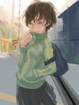  1girl backpack bag brown_eyes brown_hair fence green_jacket hand_in_pocket looking_at_viewer mosaique persona persona_4 power_lines railroad_crossing road satonaka_chie skirt smile street 