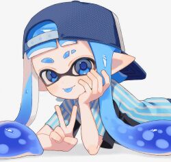  1girl :p backwards_hat baseball_cap blue_eyes blue_pupils blue_shirt commentary eyebrow_cut greek_commentary hat highres inkling inkling_girl inkling_player_character long_hair looking_at_viewer lying on_stomach pointy_ears sabata_saba shirt simple_background solo splatoon_(series) striped_clothes striped_shirt tentacle_hair tongue tongue_out v white_background 