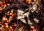  1girl autumn_leaves black_hair black_legwear black_wings blonde_hair cross doll_joints gothic_lolita hairband highres kneehighs layered_dress lolita_fashion lolita_hairband long_hair long_sleeves looking_at_viewer lying memai on_back red_eyes rozen_maiden solo suigintou white_background wide_sleeves wings 