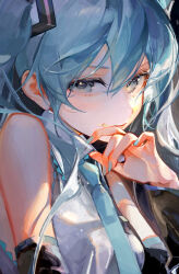 1girl absurdres ame929 bare_shoulders black_sleeves blue_eyes blue_hair blue_nails blue_necktie breasts closed_mouth collared_shirt commentary detached_sleeves double-parted_bangs food food_on_face grey_shirt hatsune_miku highres light_particles long_hair looking_at_viewer medium_breasts necktie shirt sleeveless sleeveless_shirt solo symbol-only_commentary twintails upper_body vocaloid 
