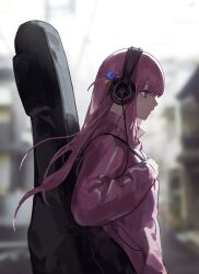  1girl absurdres blue_eyes blurry blurry_background bocchi_the_rock! closed_mouth commentary_request cube_hair_ornament day from_side gotoh_hitori guitar_case hair_ornament hand_up headphones highres holding_strap instrument_case jacket looking_ahead looking_at_viewer outdoors pink_hair pink_jacket rrumirumi_x solo track_jacket 