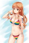  1girl bangs bikini breasts brown_eyes brown_hair cleavage closed_mouth collarbone earrings front-tie_bikini jewelry long_hair midriff nami navel necklace one_piece side-tie_bikini smile solo standing striped striped_bikini striped_swimsuit swimsuit tattoo 