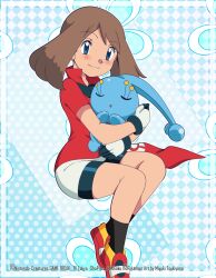  1girl bandana bike_shorts blue_background blue_eyes brown_hair closed_eyes english_commentary floating full_body highres holding holding_pokemon manaphy may_(pokemon) medium_hair miyuki_tsukiyono patterned_background pokemon pokemon_(anime) pokemon_(creature) pokemon_rse_(anime) polka_dot polka_dot_background red_bandana red_shirt shirt shoes simple_background sitting smile sneakers 