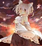  1girl animal_ears autumn_leaves bare_shoulders clouds detached_sleeves hat inubashiri_momiji long_sleeves looking_at_viewer mountain red_eyes senju_(uroakono) shirt silver_hair skirt smile solo sunset tail tokin_hat touhou turning wide_sleeves wolf_ears wolf_tail 