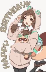  1girl 39degrees animal animal_ear_hood arrow_(symbol) backpack bag black_pantyhose brown_eyes brown_hair brown_hoodie brown_shoes commentary_request cowboy_shot hair_ornament hand_up happy_birthday highres holding holding_animal hood hood_up hoodie idolmaster idolmaster_million_live! idolmaster_million_live!_theater_days kitazawa_shiho legs_up long_hair long_sleeves looking_at_viewer low_twintails open_mouth pantyhose raccoon raccoon_tail recycling_symbol shoes simple_background solo tail twintails white_background x_hair_ornament 