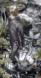  1boy blue_oak brown_hair commentary_request day grass highres lily_pad long_shirt long_sleeves looking_down male_focus open_mouth outdoors pants pokemon pokemon_(creature) pokemon_red/green/blue/yellow purple_shirt ripples sekaiitinoki shirt short_hair spiky_hair vaporeon wading water 