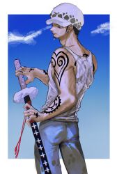  1boy absurdres adam's_apple back_tattoo border closed_mouth commentary facial_hair goatee grey_pants hand_tattoo hat heart heart_tattoo highres holding holding_sword holding_weapon long_sideburns male_focus one_piece pants po_(posutwo) shirt short_hair shoulder_tattoo sideburns solo sword tank_top tattoo trafalgar_law untranslatable_commentary weapon wet wet_clothes wet_shirt white_border white_hat white_tank_top 
