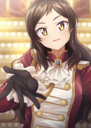  1girl aiguillette ascot black_gloves blurry blurry_background brown_hair commentary_request epaulettes etoile_brilliant_(idolmaster) gloves highres idolmaster idolmaster_million_live! idolmaster_million_live!_theater_days jacket kitazawa_shiho liselsia long_hair looking_at_viewer official_alternate_costume outstretched_hand red_jacket solo upper_body white_ascot yellow_eyes 
