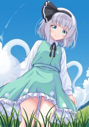  1girl absurdres black_hairband black_ribbon blue_eyes blue_sky clouds collared_shirt commentary_request day frilled_skirt frills grass green_skirt green_vest grey_hair hairband highres hitodama hitodama_print konpaku_youmu konpaku_youmu_(ghost) looking_at_viewer medium_hair neck_ribbon outdoors reimei_(r758120518) ribbon shirt skirt skirt_set sky smile solo touhou vest white_shirt youmu_day 