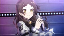  1girl black_bow black_bowtie blush bow bowtie brown_hair closed_mouth commentary_request concert dress grey_dress highres holding holding_microphone idol idolmaster idolmaster_million_live! idolmaster_million_live!_theater_days juliet_sleeves kitazawa_shiho light_smile liselsia long_hair long_sleeves looking_ahead microphone official_alternate_costume proud_of_stage_(idolmaster) puffy_sleeves solo upper_body yellow_eyes 