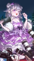  1girl 6+others alternate_costume bracelet camera chest_jewel commentary dahaidan double_bun dress earrings fur_shawl gem grey_hair hair_bun handheld_game_console highres holding holding_camera holding_handheld_game_console hololive hololive_english jewel_under_eye jewelry koseki_bijou layered_dress long_hair multiple_others night nintendo_switch open_mouth outdoors purple_dress purple_gem purple_nails shawl solo_focus taking_picture tree violet_eyes virtual_youtuber 