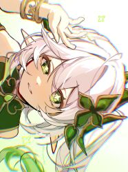  1girl bare_shoulders commentary genshin_impact green_eyes green_hair hair_ornament hand_up haru_sakura3915 highres looking_at_viewer multicolored_hair nahida_(genshin_impact) parted_lips pointy_ears sideways sleeveless solo star-shaped_pupils star_(symbol) symbol-shaped_pupils twitter_username white_background white_hair 