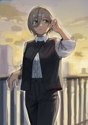 1girl absurdres black_pants black_vest commentary_request dress_shirt earrings girls_band_cry green_eyes hair_between_eyes highres jewelry long_hair_between_eyes mole mole_under_eye multicolored_hair open_mouth pants railing roots_(hair) rupa_(girls_band_cry) shirt solo sunset suru_(seiya) three-quarter_sleeves vest white_shirt 
