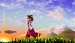  1girl ascot bow brown_hair clenched_hand clouds detached_sleeves grass hair_bow hair_tubes hakurei_reimu hand_behind_head highres lens_flare looking_at_viewer midriff mountain noronosuke orange_eyes short_hair skirt skirt_set sky solo sunset touhou 