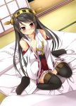  1girl black_hair black_legwear blush detached_sleeves futon hairband haruna_(kantai_collection) highres japanese_clothes kantai_collection long_hair looking_at_viewer personification red_eyes sanada_ikki shiny shiny_skin sitting skirt smile solo thighhighs 