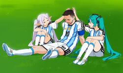  1boy 2026_fifa_world_cup 2girls aqua_hair argentinian_national_soccer_team_uniform black_hair cleats closed_eyes commentary crossover earrings elf english_commentary frieren full_body grass grey_hair hand_on_another's_head headpat highres jewelry knees_to_chest lionel_messi long_hair long_pointy_ears multiple_crossover multiple_girls parted_bangs pointy_ears real_life sad short_sleeves shorts sitting smile snegovski soccer_field soccer_uniform socks sousou_no_frieren sportswear teardrop_earrings thighs twintails very_long_hair white_shorts white_socks world_cup 