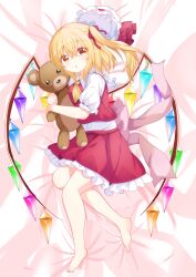  1girl absurdres ascot back_bow barefoot blonde_hair bow collared_shirt commentary_request crystal crystal_wings dakimakura_(medium) flandre_scarlet frilled_shirt_collar frilled_skirt frills hat hat_ribbon highres hugging_doll hugging_object missing_headwear mob_cap multicolored_wings one_side_up pink_bow puffy_short_sleeves puffy_sleeves red_eyes red_skirt red_vest ribbon samoflower shirt short_sleeves skirt skirt_set solo stuffed_animal stuffed_toy teddy_bear toes touhou unworn_headwear vest white_hat white_shirt wings yellow_ascot 