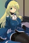  1girl asamiko atago_(kantai_collection) black_gloves blonde_hair blush breasts commentary gloves green_eyes hat highres kantai_collection large_breasts long_hair looking_at_viewer military military_uniform on_bed pantyhose personification smile solo uniform wink 