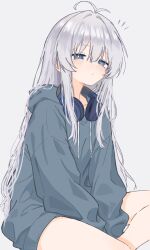  1girl antenna_hair arms_between_legs blue_eyes bottomless closed_mouth grey_hair hair_between_eyes hair_intakes headphones headphones_around_neck highres hood hoodie k4n4s4n light_blush long_hair looking_at_viewer notice_lines original sidelocks simple_background solo white_background white_hair 