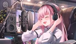  1girl ahoge braid ceiling_light chair clock closed_eyes earrings headphones highres indoors jewelry jishenkong_jihua long_hair microphone nemesis_(jishenkong_jihua) open_mouth pink_hair recording_studio shirt sitting solo soundboard speaker teeth upper_teeth_only virtual_youtuber white_shirt xiaodai_lonely 