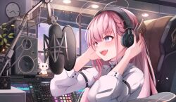  1girl ahoge braid ceiling_light chair clock earrings headphones highres indoors jewelry jishenkong_jihua long_hair microphone nemesis_(jishenkong_jihua) open_mouth pink_hair recording_studio shirt sitting solo soundboard speaker teeth upper_teeth_only violet_eyes virtual_youtuber white_shirt xiaodai_lonely 