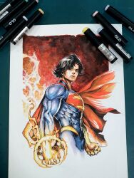  1boy absolute_dc absolute_superman art_tools_in_frame black_hair cape clark_kent claylim8831 clenched_hands closed_mouth commentary dc_comics english_commentary fire hair_over_one_eye highres male_focus marker_(medium) multicolored_suit muscular muscular_male photo_(medium) red_cape short_hair soccer_uniform solo sportswear superman superman_(absolute_dc) superman_logo traditional_media two-tone_suit 