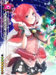  1girl capelet christmas_lights christmas_ornaments closed_mouth haru_(haru2079) highres looking_at_viewer love_live!_school_idol_project miniskirt nishikino_maki red_eyes redhead short_hair skirt smile solo 