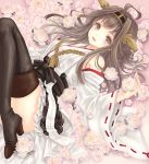  1girl bare_shoulders black_legwear blush brown_eyes brown_hair detached_sleeves double_bun flower hair_ornament hairband headgear japanese_clothes kantai_collection kongou_(kantai_collection) kotobuki-a long_hair lying nontraditional_miko open_mouth personification pink_rose rose skirt smile solo thighhighs 