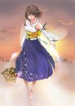  1girl barefoot blue_eyes brown_hair detached_sleeves dissidia_012_final_fantasy dissidia_final_fantasy final_fantasy final_fantasy_x green_eyes hair_ornament hakama heterochromia highres japanese_clothes short_hair sky smile solo sunset ten_(k1208) wand yuna 