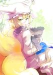  1girl blonde_hair dress fox_tail hat hat_with_ears long_sleeves looking_at_viewer looking_back multiple_tails sinzan solo tabard tail tongue tongue_out touhou white_dress wide_sleeves yakumo_ran yellow_eyes 