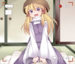  1girl blonde_hair commentary_request futon hair_ribbon hammer_(sunset_beach) hat long_hair long_sleeves looking_at_viewer moriya_suwako open_mouth recording ribbon shirt sitting skirt skirt_set smile solo tatami touhou v_arms vest violet_eyes wide_sleeves 