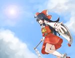  1girl ascot bare_shoulders black_hair bow brown_eyes chachami_ashu clouds detached_sleeves dress hair_bow hair_tubes hakurei_reimu highres lens_flare long_hair looking_at_viewer open_mouth outstretched_hand red_dress sarashi skirt skirt_set sky solo sun touhou 