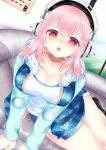  1girl blush breasts cleavage headphones highres large_breasts legs_together long_hair looking_at_viewer nitroplus open_mouth pink_eyes pink_hair solo super_sonico 