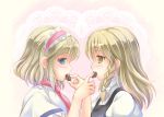  2girls alice_margatroid blonde_hair blue_eyes blush bow braid bust capelet chocolate doily eye_contact feeding food_in_mouth gradient gradient_background hair_bow hairband heart kirisame_marisa lolita_hairband long_hair looking_at_another multiple_girls no_hat pink_background puffy_short_sleeves puffy_sleeves ribbon short_hair short_sleeves single_braid takatsukasa_yue touhou valentine yellow_eyes yuri 
