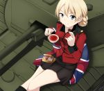  1girl blonde_hair blue_eyes braid chocolate churchill_(tank) cup darjeeling girls_und_panzer highres holding looking_at_viewer looking_up military military_vehicle nksk pillow short_hair sitting skirt smile solo tank tea teacup uniform union_jack vehicle 