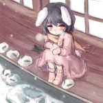  1girl animal_ears black_hair blush breath bunny_tail dress furorida inaba_tewi mittens pink_clothes pink_dress rabbit_ears red_eyes scarf sitting snow snowball tail touhou 