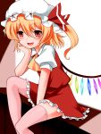  1girl blonde_hair blush elbow_rest fang flandre_scarlet hat highres kitarow pink_legwear red_eyes side_ponytail smile solo thigh-highs touhou wings 