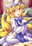  1girl blonde_hair blush breasts fox_tail fun_bo hat large_breasts looking_at_viewer multiple_tails open_mouth short_hair slit_pupils solo tail tears torn_clothes touhou yakumo_ran yellow_eyes 