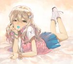  1girl blonde_hair boots brown_eyes candy dekappara_futoriusu hair_ornament legs_up lollipop long_hair looking_at_viewer lying mouth_hold on_stomach original simple_background skirt smile solo star_hair_ornament 