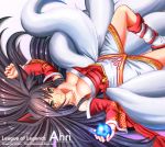  1girl ahri animal_ears artist_name black_hair breasts character_name cleavage copyright_name detached_sleeves facial_mark fox_ears fox_tail hair_spread_out large_breasts league_of_legends long_hair lying multiple_tails on_back orb ranken smile solo tail whisker_markings yellow_eyes 