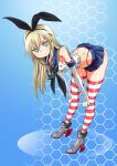  1girl :&lt; bare_shoulders bent_over blonde_hair chestnut_mouth green_eyes hex_grid high_heels highres kantai_collection long_hair rantia shimakaze_(kantai_collection) skirt solo striped striped_legwear thighs 