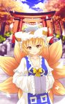  1girl blonde_hair fox_tail hat highres multiple_tails short_hair smile solo tail touhou x&amp;x&amp;x yakumo_ran yellow_eyes 