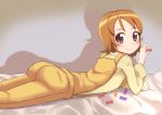  1girl aratsuka blush brown_eyes brown_hair happinesscharge_precure! lying on_stomach oomori_yuuko overalls precure short_hair smile solo 