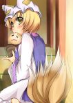  blush highres looking_back mouth_hold multiple_tails shi_ecchi short_hair solo tail touhou yakumo_ran 